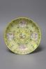 A Chinese yellow ground medallion saucer dish, Jiaqing mark, 19th century, diameter 20cm                                                                                                                                    