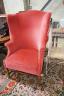 A George III provincial upholstered tub shaped armchair, width 76cm, depth 58cm, height 120cm                                                                                                                               