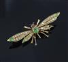 An early 20th century gold, demantoid garnet and seed pearl set bug brooch, 46mm.                                                      