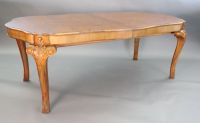 A Queen Anne style burr walnut extending dining table, W.3ft 5in. L.6ft 10in. extends to 8ft 10in. H.2ft 6in.                          