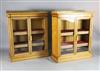 A pair of late Victorian Holland & Sons satinwood dwarf bookcases, W.3ft 3in. D.1ft 4in. H.4ft                                         