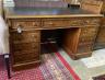 A Victorian mahogany pedestal desk, fitted with nine small drawers, length 138cm, depth 68cm, height 77cm                                                                                                                   