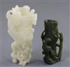 A Chinese archaistic white jade rhyton and a spinach green jade vase, 18th/19th century, H. 11cm and 8.5cm                             