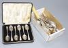 A set of nine George IV silver fiddle pattern teaspoons, London , 1821, two later sets of six silver teaspoons, one cased, five other silver teaspoons, a silver butter knife and an ivory handled silver serving fork      