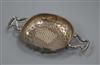 A late 18th century unmarked white metal lemon strainer, 20.8cm.                                                                       