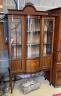 An Edwardian inlaid mahogany bow fronted display cabinet, width 114cm, depth 42cm, height 209cm                                                                                                                             