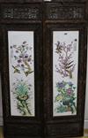 A pair of Chinese porcelain panels, in carved wood frames panels 75 x 21cm                                                             