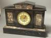 A French marble insert black slate mantle timepiece, early 20th century                                                                                                                                                     