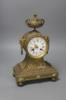 A Louis XVI style bronze mantel clock, height 38cm                                                                                                                                                                          