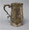 A George III later embossed silver mug, London, 1781, 10.5 oz.                                                                         