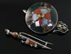 A Scottish silver and multi hardstone 'sword and shield' brooch and a similar gem and hardstone set dirk brooch, largest 72mm.         