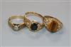 A 9ct gold tiger's eye ring, a gem-set 10ct gold ring and a 9ct gold and diamond textured ring.                                        