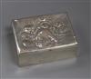 A George V silver cigarette box, embossed with imbibers, London, 1926, 12.7cm.                                                         