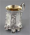 A cased Victorian ornate silver christening mug, 11cm.                                                                                 