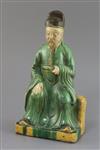 A Chinese sancai ridge tile modelled as the seated figure of Guandi, Ming dynasty, H. 30cm                                             