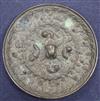 A Chinese bronze mirror 11cm diameter                                                                                                  