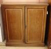 An Edwardian satinwood banded two-door mahogany side cabinet W.108cm                                                                   