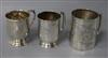 A George V engraved silver christening mug and two other silver christening mugs.                                                      