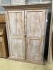 A Victorian pine two door cupboard, width 120cm, depth 45cm, height 170cm                                                                                                                                                   