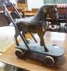 A Victorian painted push along toy horse, width 60cm                                                                                                                                                                        