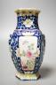 A Chinese blue ground famille rose hexagonal vase, late 19th century, 15cm                                                                                                                                                  