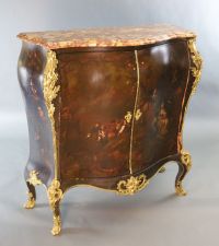 A late 19th century Louis XVI style serpentine bombe commode, W.4ft D.1ft 8in. H.4ft 3in.                                              