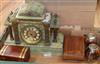 A French onyx mantel clock, two cigarette boxes and two nutshell vases                                                                 