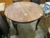 A 1920's circular mahogany extending dining table with three leaves and handle, length approx. 230cm                                                                                                                        