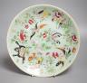 A Chinese celadon ground famille rose plate, Daoguang mark and of the period. 26cm diameter                                                                                                                                 