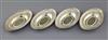 A set of four George III embossed silver gilt oval nut dishes by John Emes, 8 oz.                                                      