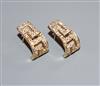 A pair of 585 yellow metal and diamond set curved earrings, 17mm.                                                                      