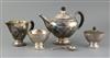 A 1920's Danish Georg Jensen sterling silver four piece tea set, together with a caddy spoon and pair of sugar tongs, gross 40.5 oz.   