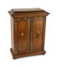 A late 19th century gilt metal mounted walnut games cabinet, W.40cm D.19cm H.49cm                                                                                                                                           
