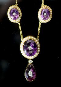 A Victorian style gold, amethyst, split pearl and old cut diamond cluster set drop necklace,                                           