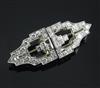 An Art Deco style white gold and diamond double clip brooch, 41mm.                                                                     