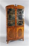 A late George III Sheraton style satinwood and burr wood bookcase, W.2ft 9in. D.10in. H.5ft 9.5in.                                     