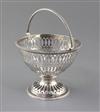 A George III pierced silver pedestal sugar basket (no liner) by Robert Hennell, 6.5 oz.                                                