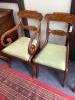 A set of six George V mahogany sabre leg dining chairs (two with arms)                                                                                                                                                      