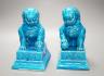 A pair of Chinese turquoise glazed temple lions 21cm                                                                                                                                                                        