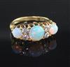 An Edwardian 18ct gold, white opal and diamond ring, size P.                                                                           