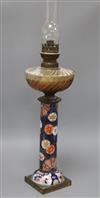 An Imari based oil lamp height 74cm incl. shade                                                                                        