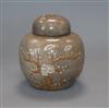 A Chinese crackle-glazed mushroom ground ginger jar and cover with prunus slip decoration                                              