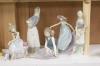 Four Lladro figurines and one Lladro style figurine, height 27cm                                                                                                                                                            