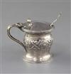 A George V Arts & Crafts silver mustard pot by Omar Ramsden, 3.5 oz.                                                                   