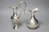 Two silver plated water jugs, height 25cm                                                                                                                                                                                   