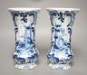 A pair of 19th century Delft blue and white vases 21.5cm                                                                                                                                                                    