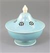 A Ruskin pottery pale blue souffle glazed bowl and cover height 18cm                                                                   