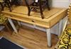 A birds eye maple veneered side table, fitted with two drawers W.144cm                                                                 