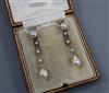 A pair of early 20th century white metal and cultured pearl? drop earrings, 44mm.                                                      