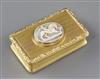 A George IV engine turned silver gilt rectangular snuff box, the lid with inset oval cameo shell                                       